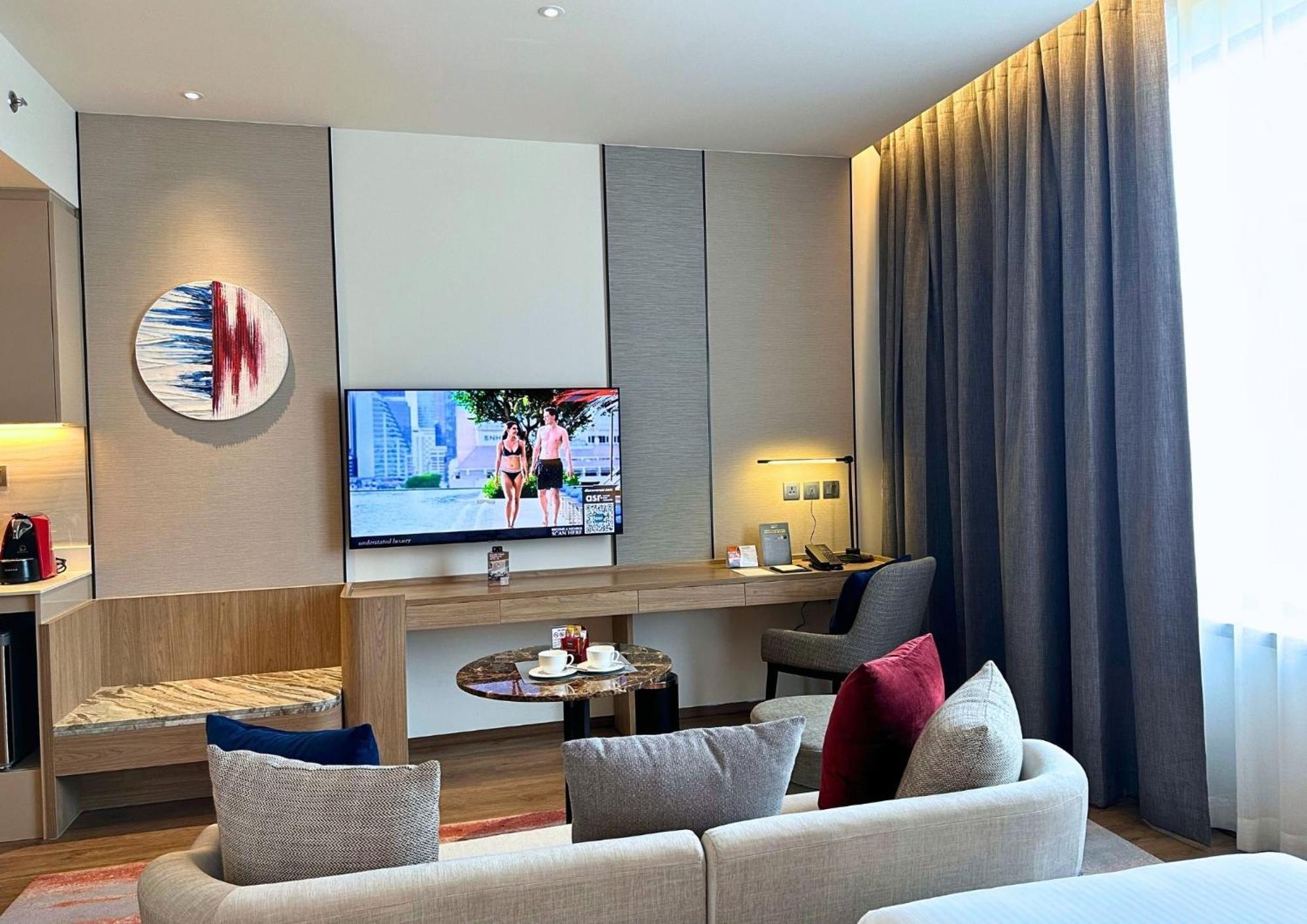מלון Ascott Embassy Sathorn בנגקוק מראה חיצוני תמונה A living room in a hotel